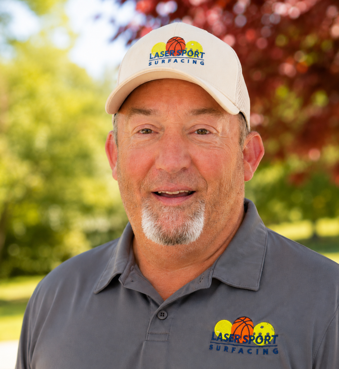Man wearing LaserSport Surfacing cap and shirt